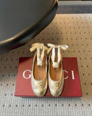 Gucci Women’s Shift Ballerina Flat in GG Canvas